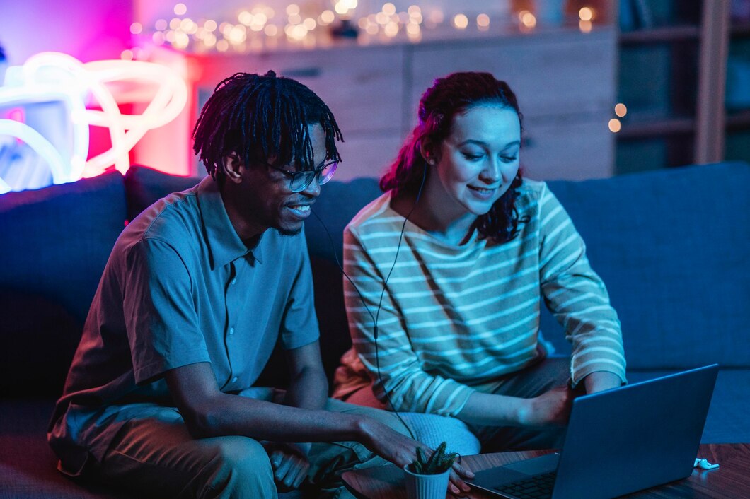 A couple watching their favorite show on their laptop, enjoying a fast connection